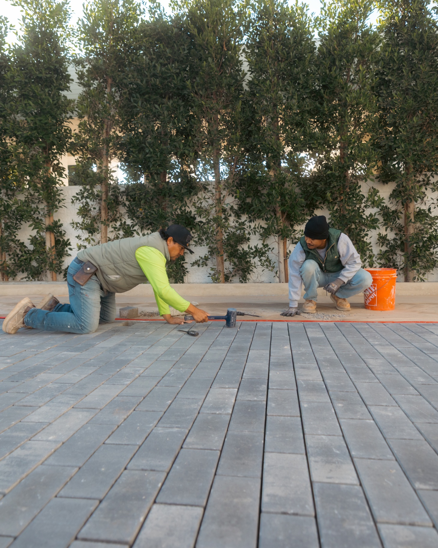 Olivos Hardscaping father and son working together on a project in San Diego